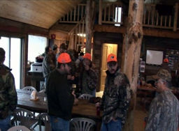 Photo of hunters relaxing in the clubhouse.